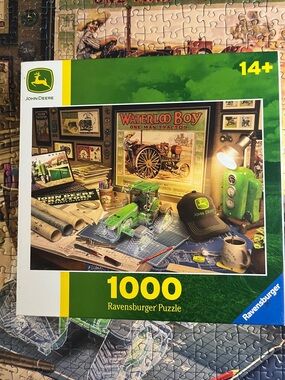 🧩 1000 piece Ravensburger “John Deere Work Desk”. Authentic artifacts. Complete